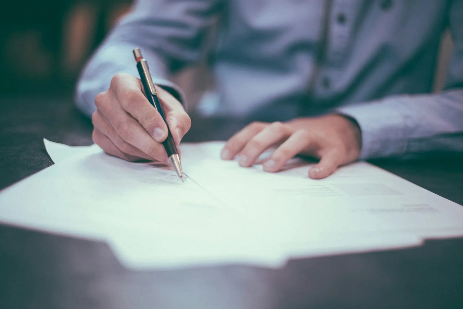 Signing business documentation with a fountain pen